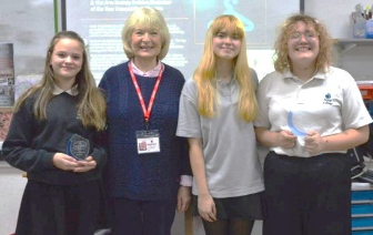 The three winners pictured with Maggie 